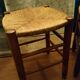 Pair of beech stools with straw seats