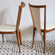 Pair of Scandinavian style wooden chairs and skaï