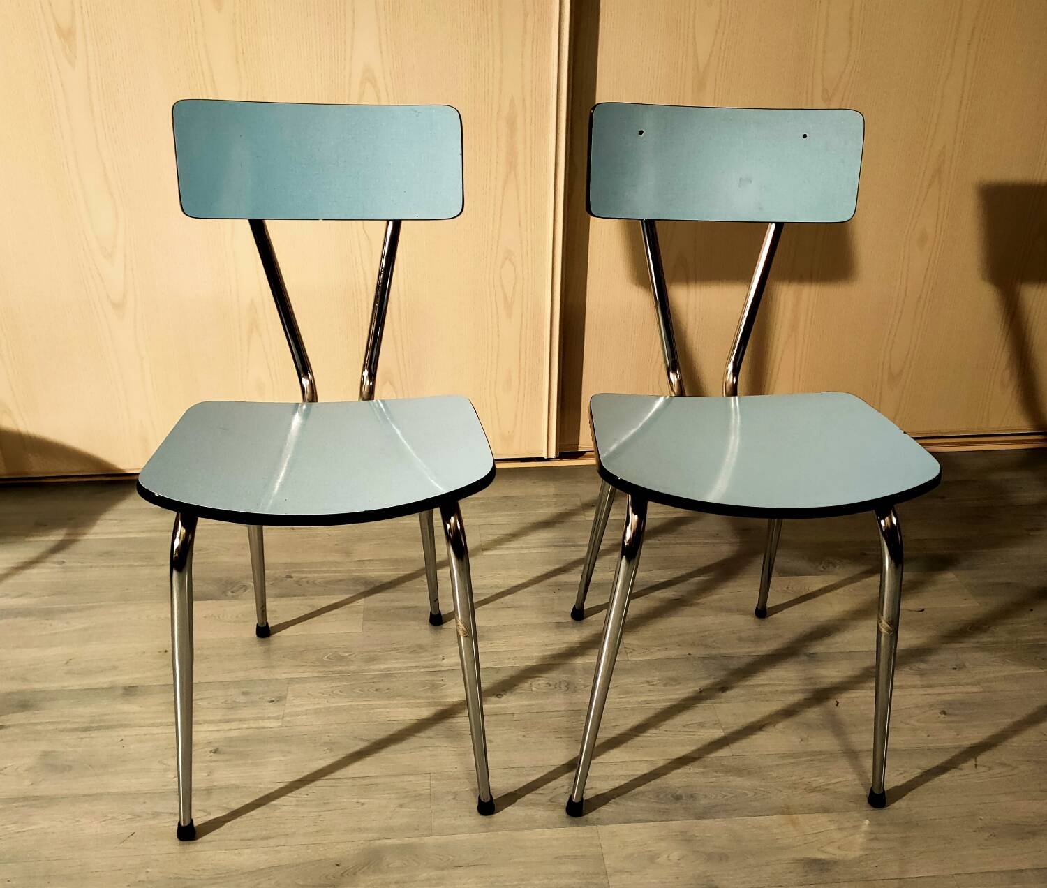 Pair of blue formica chairs