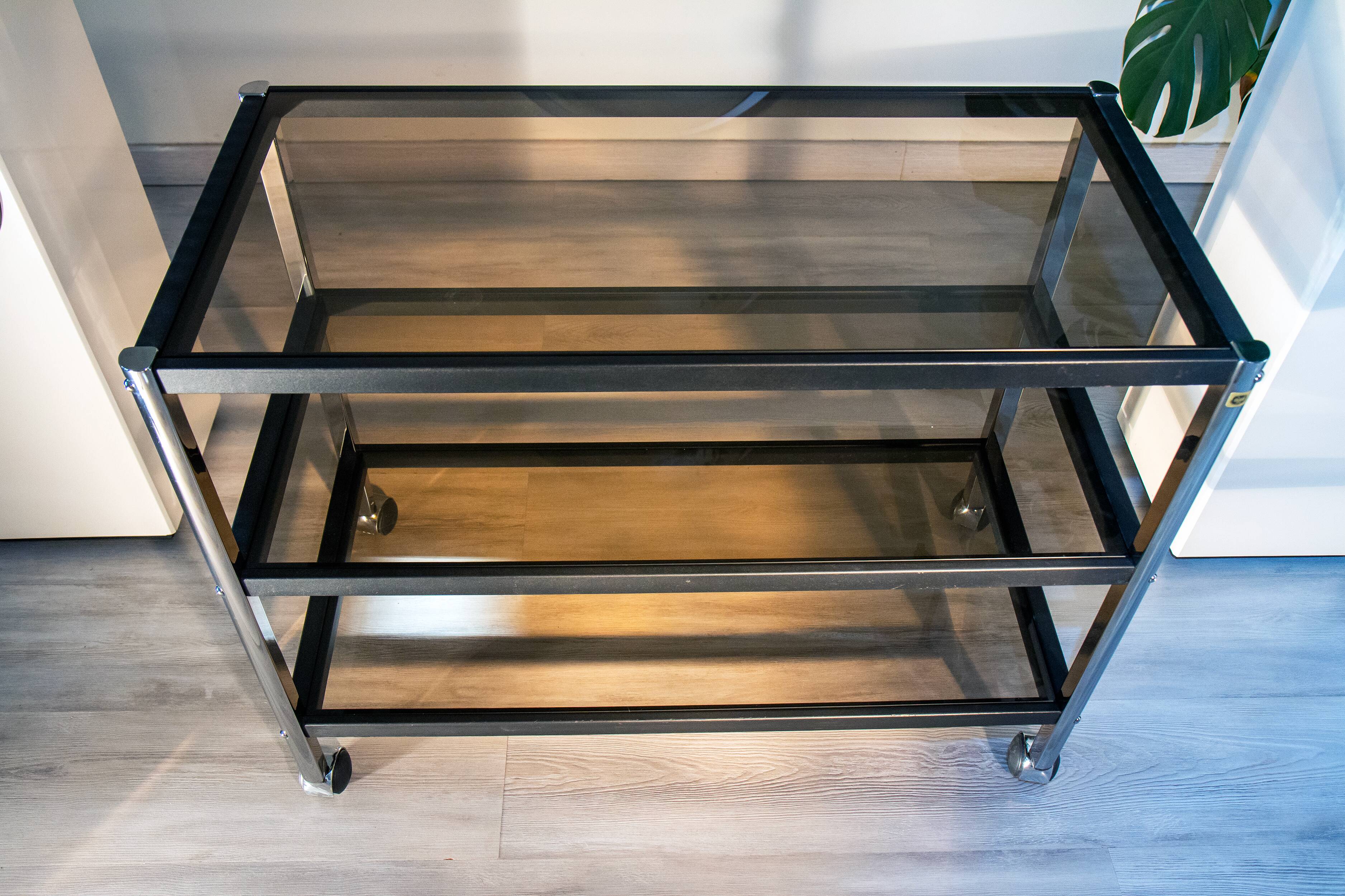 ERARD console (France), black metal and smoked glass side table, 1980.