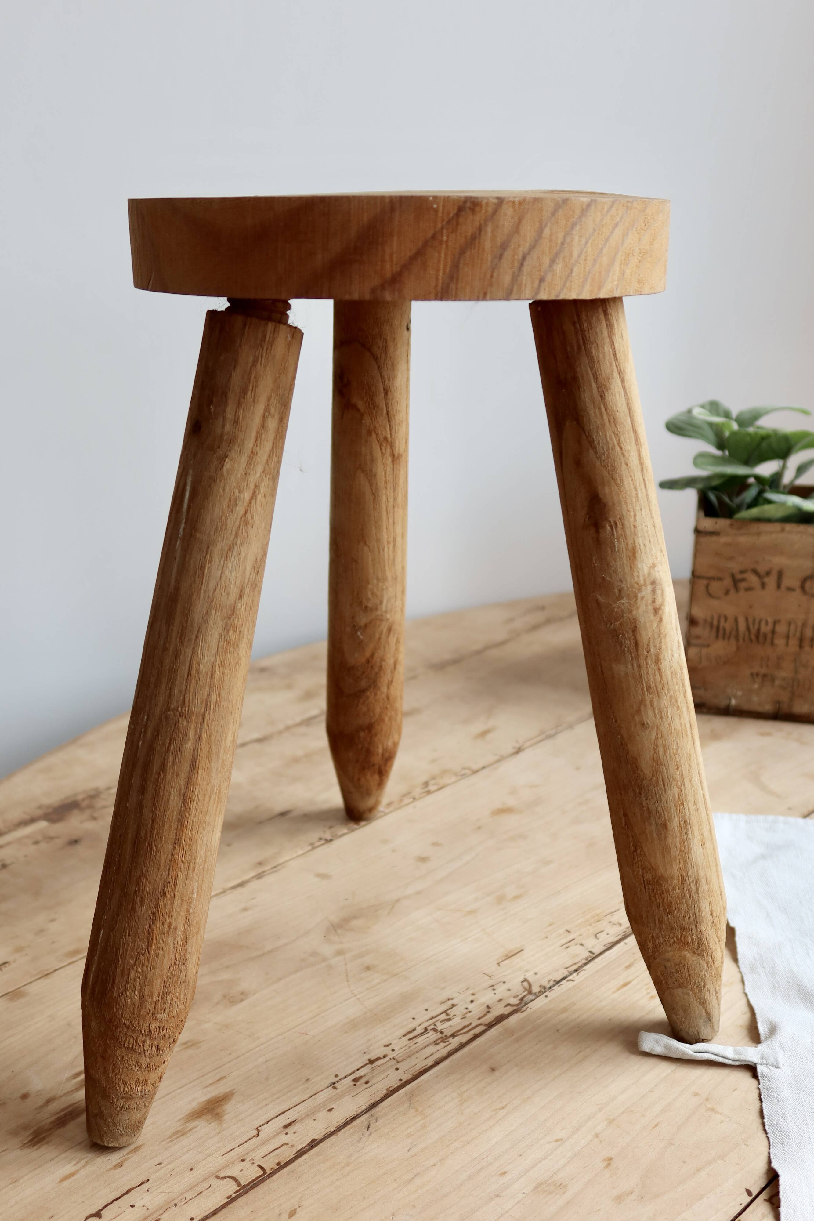 Vintage tripod stool in light raw wood