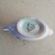 Iron earth sauce boat with floral pattern