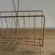 Magazine rack in gold metal and bamboo from the 60s