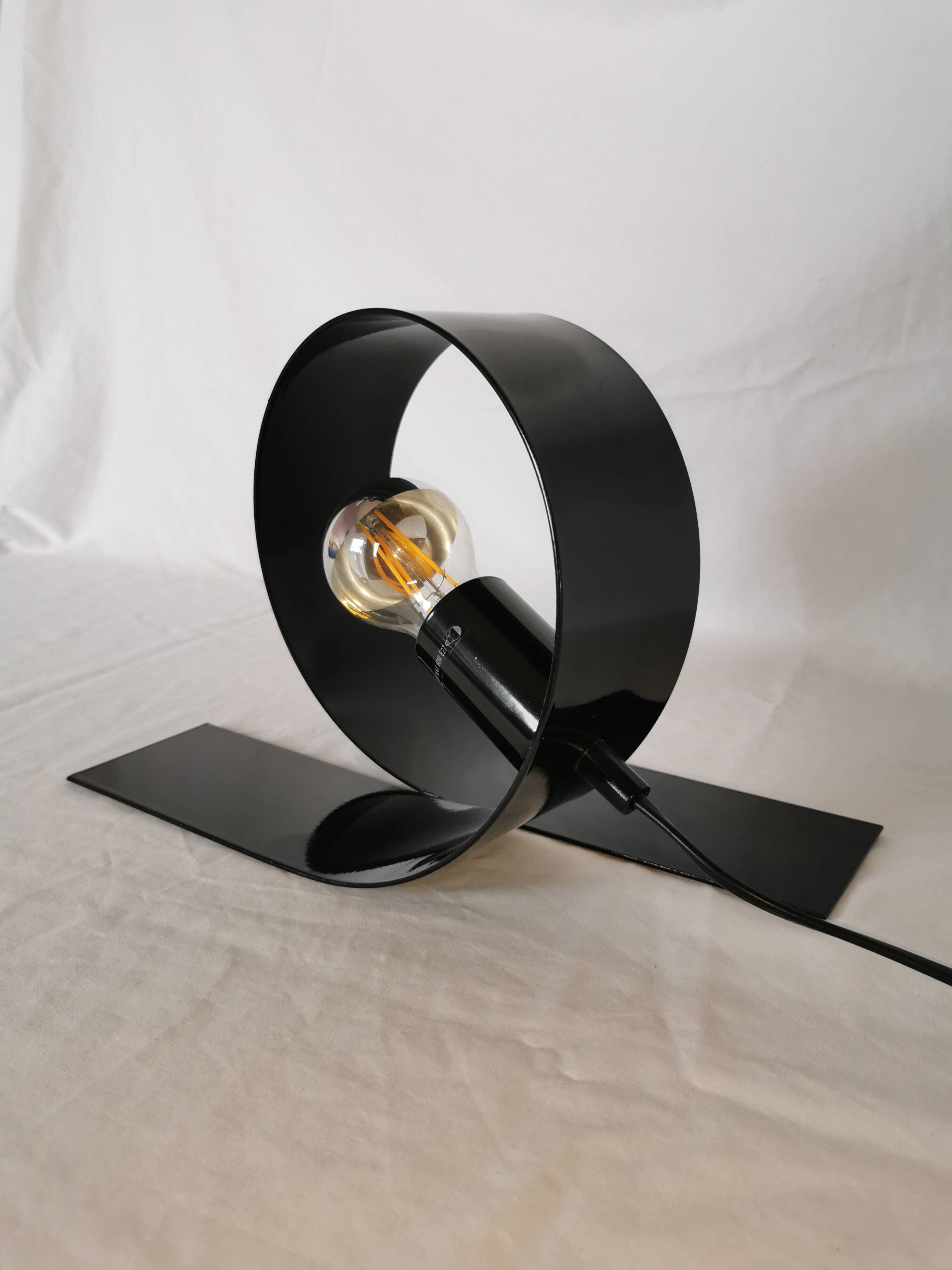 Steel looping lamp, Massive, Belgium, 1990.