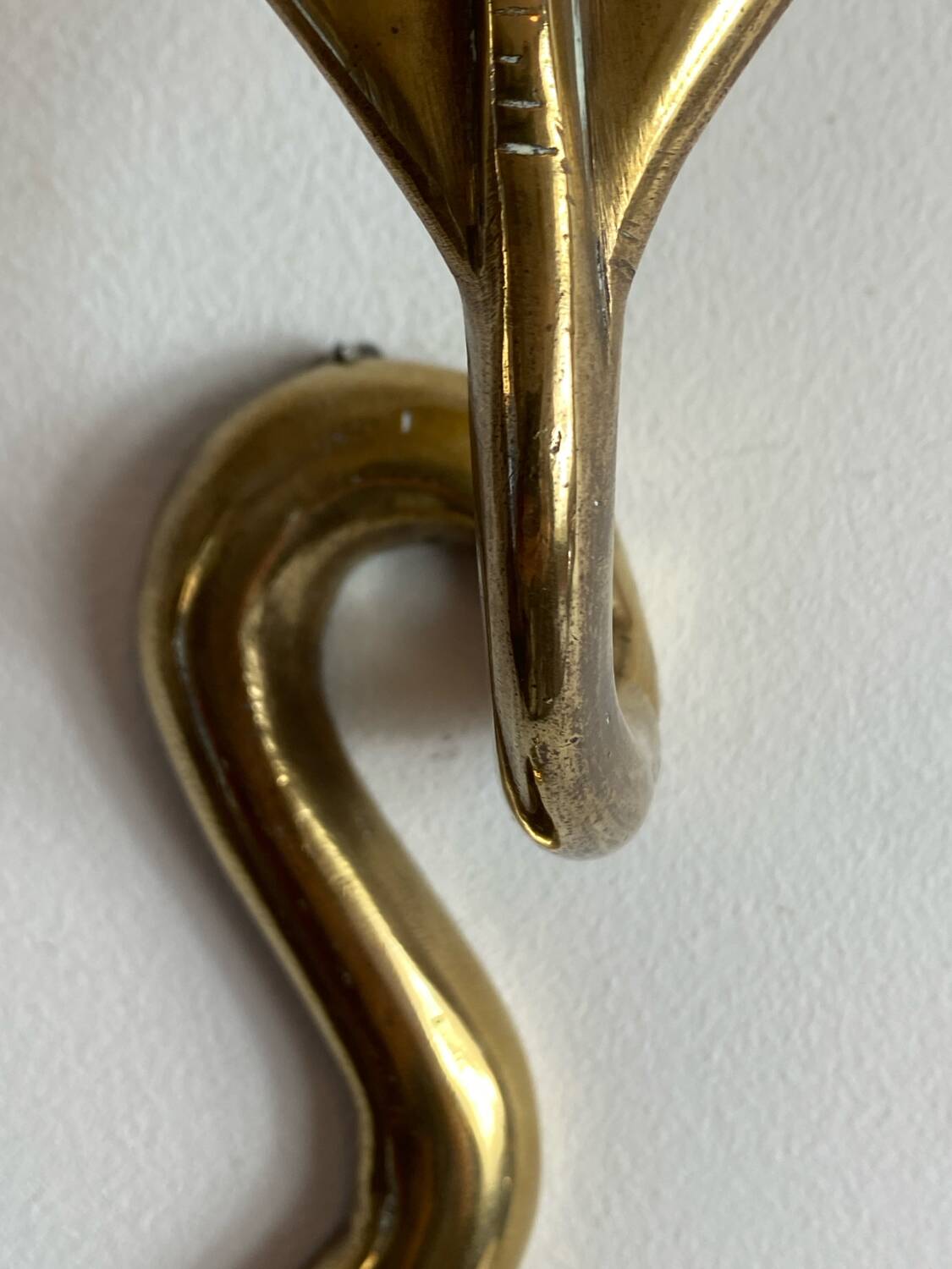 Large brass cobra wall candle holder