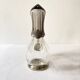Ewer, decanter in silver-plated metal and glass