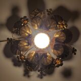 Golden metal flower sconces