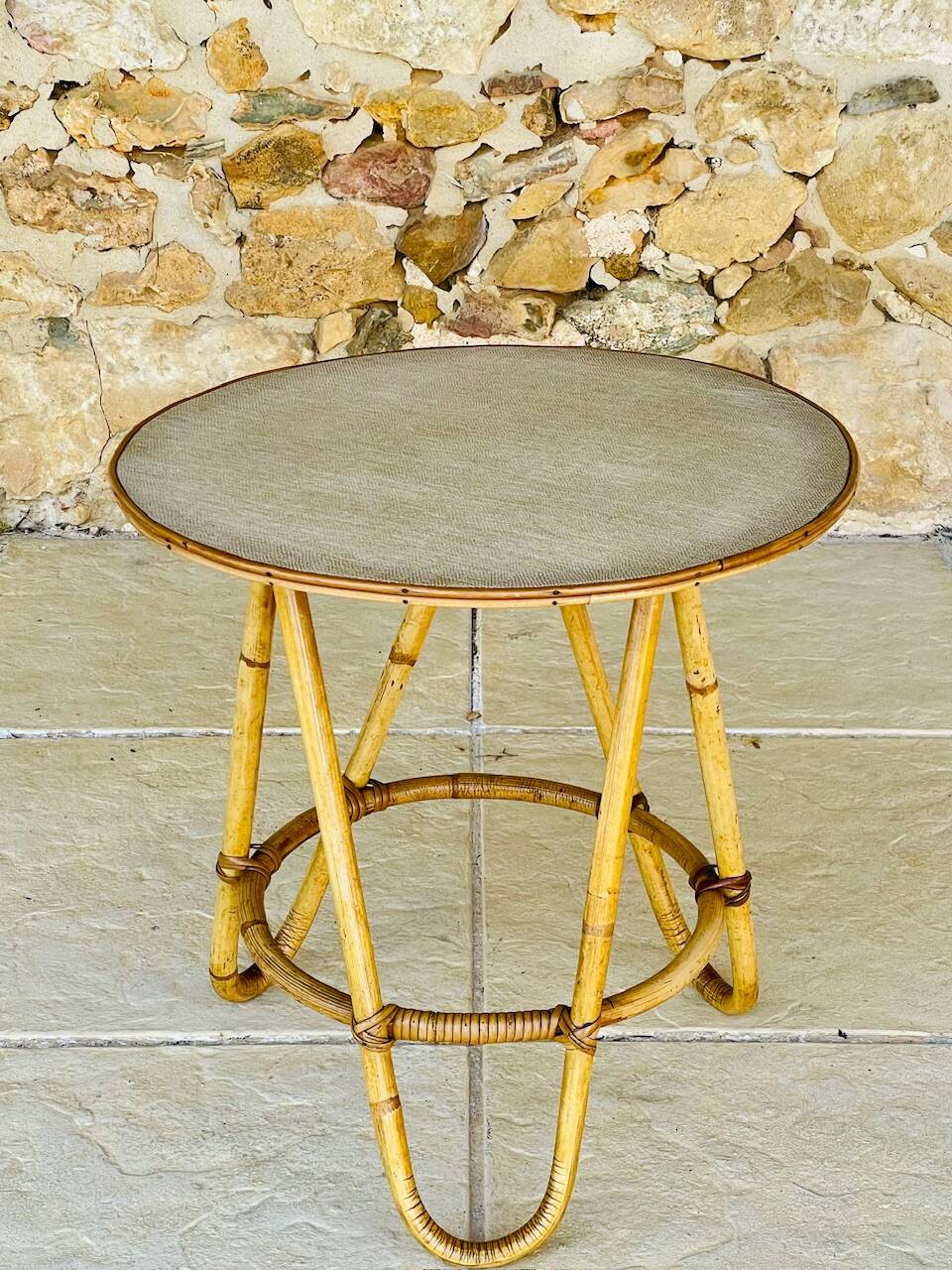 Vintage rattan and bamboo side table, circa 1969.