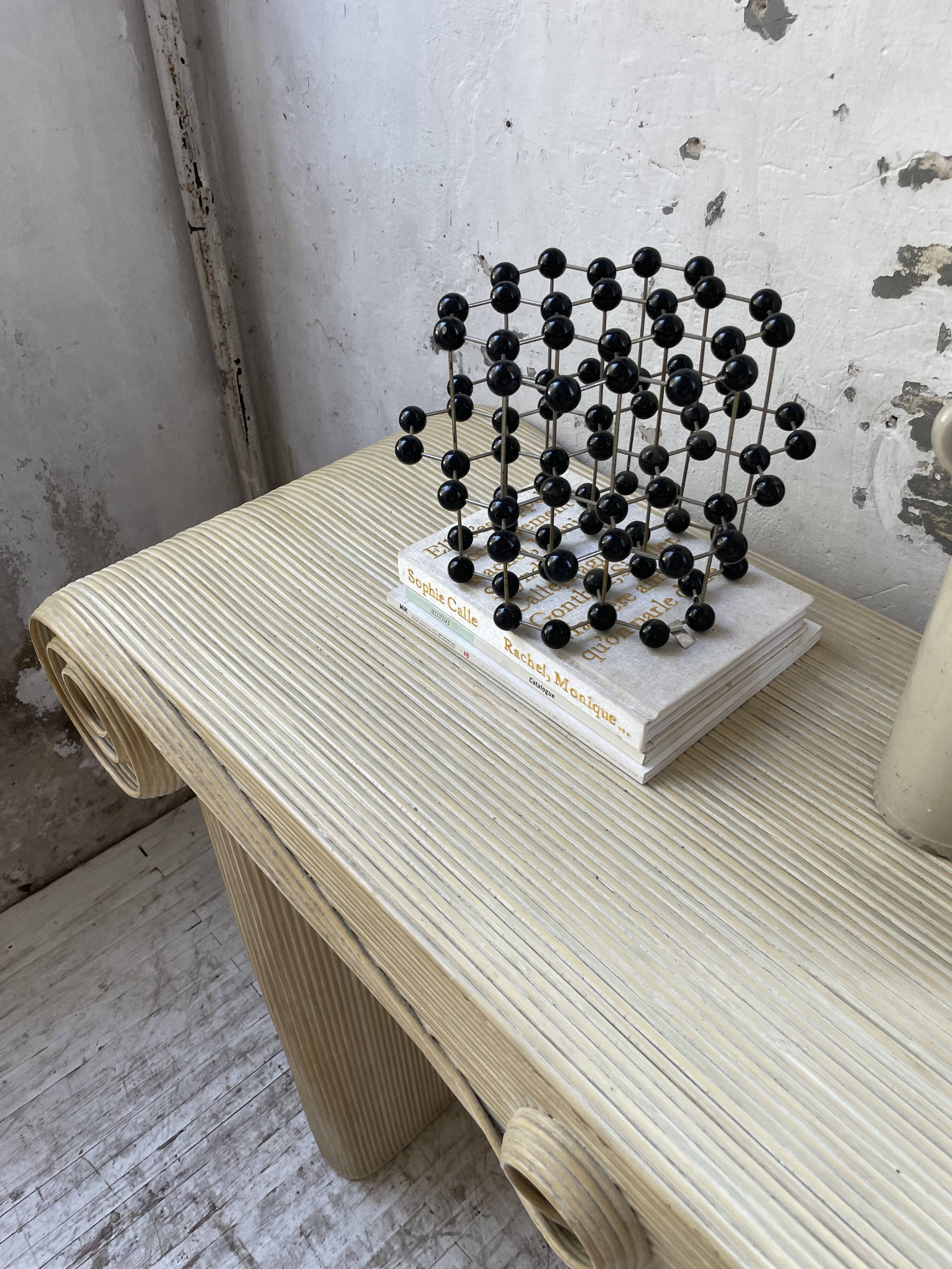 70s console in tropicalist rattan