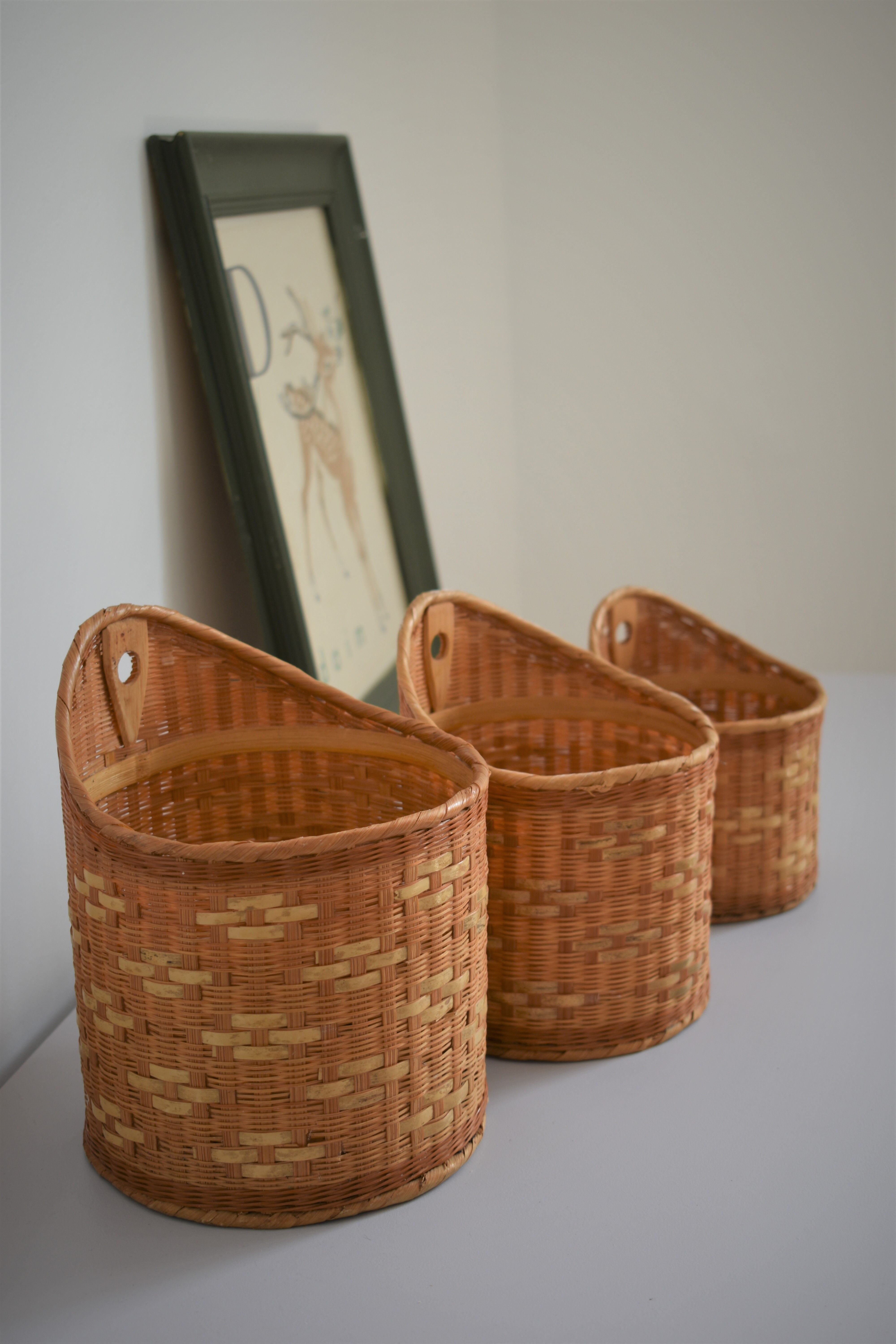Trio of walled jar cache in braided wicker