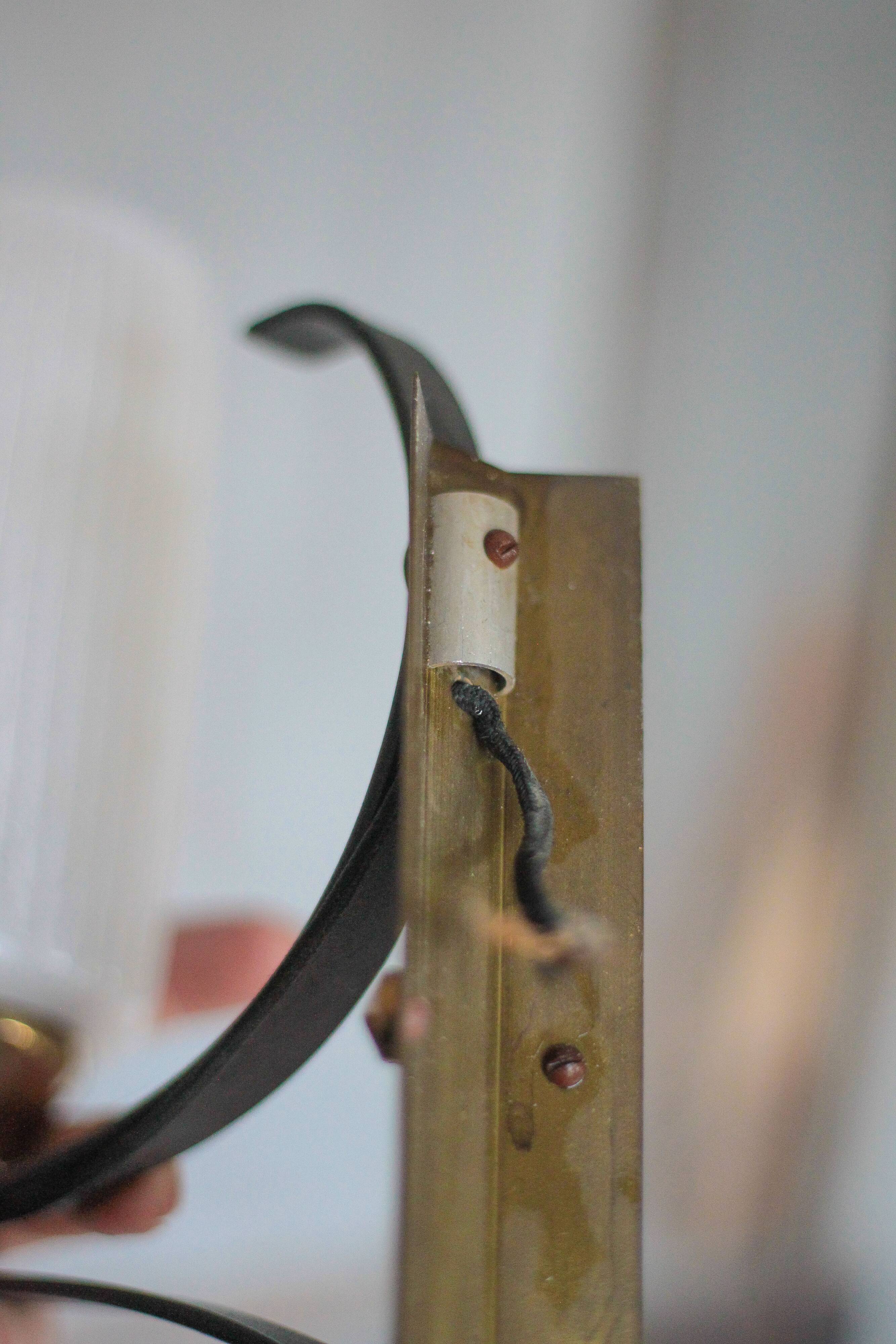 Vintage brass and iron wall light from the 1960s, Arlus.