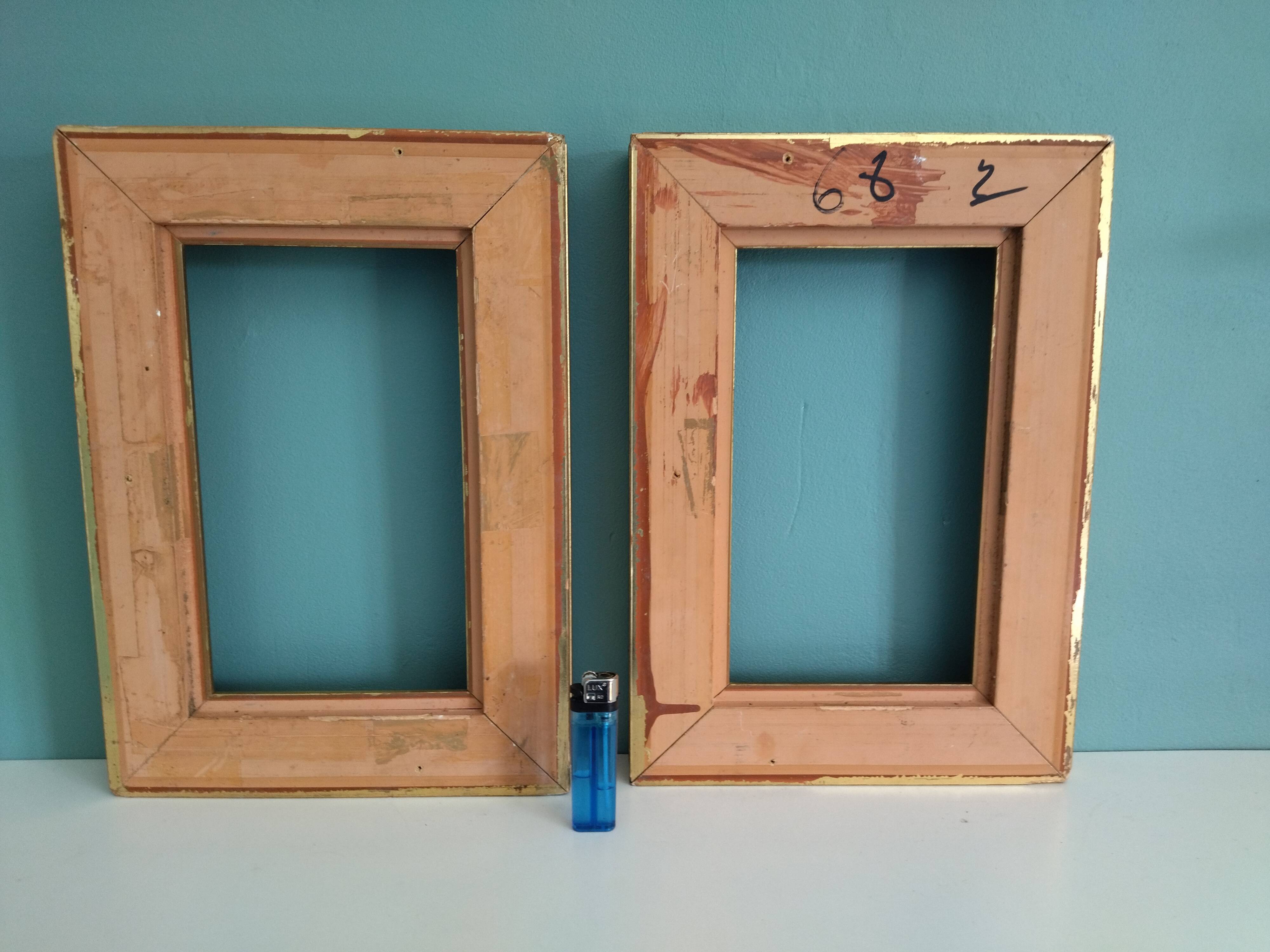 Pair of frames in old carved wood