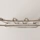 Silver metal modernist table mat