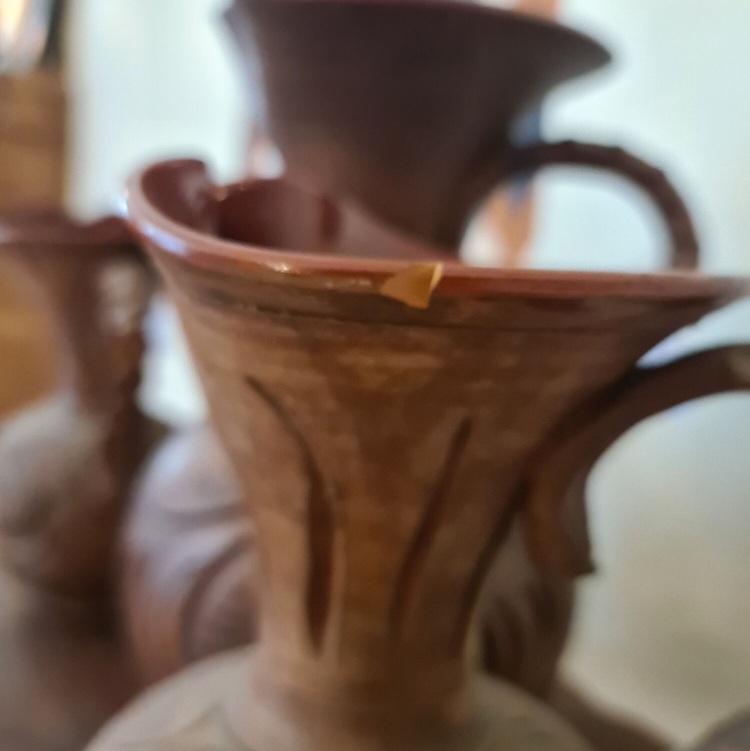 Set of carved terracotta pitchers