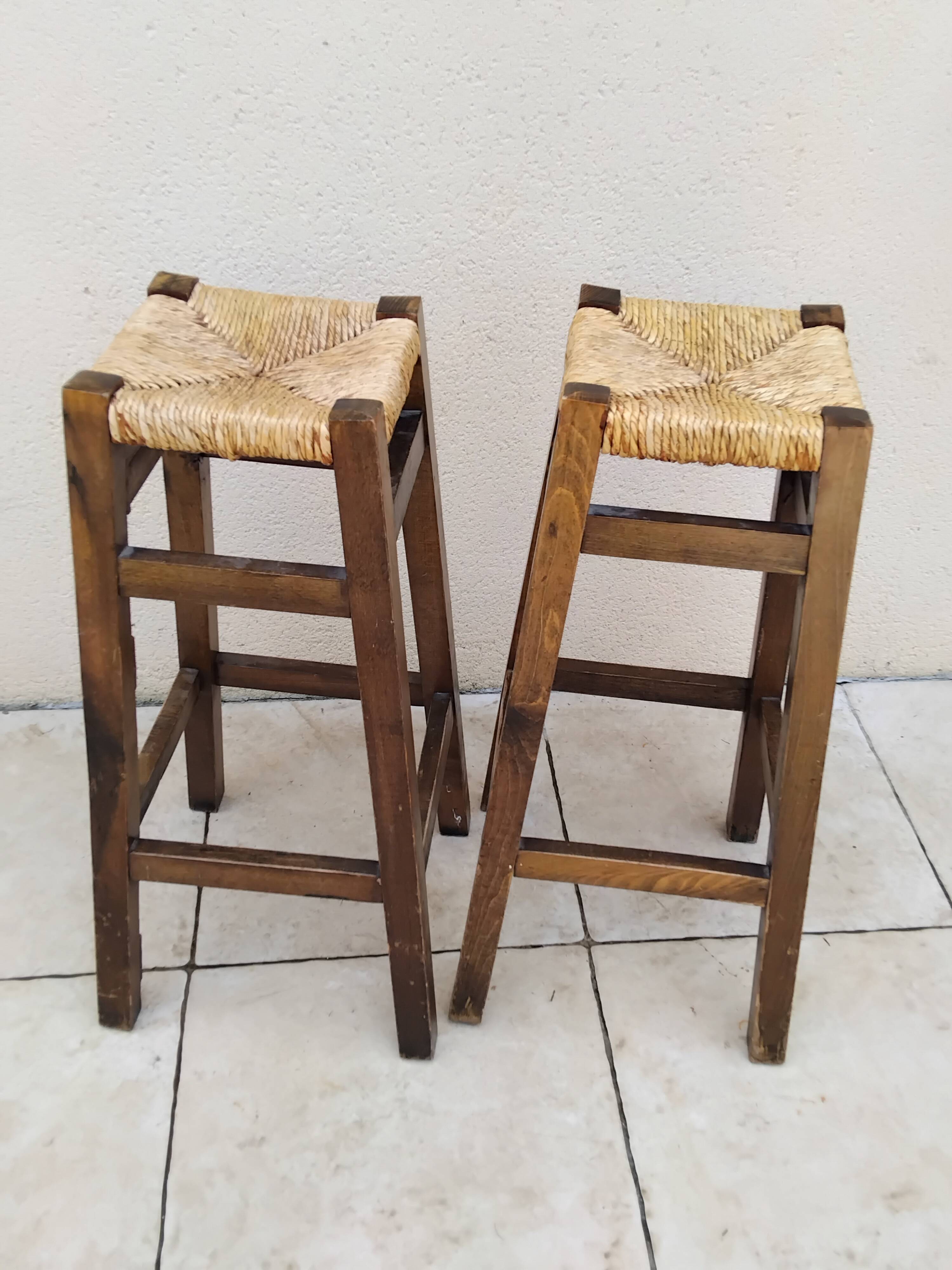 Pair of vintage stools with straw seats