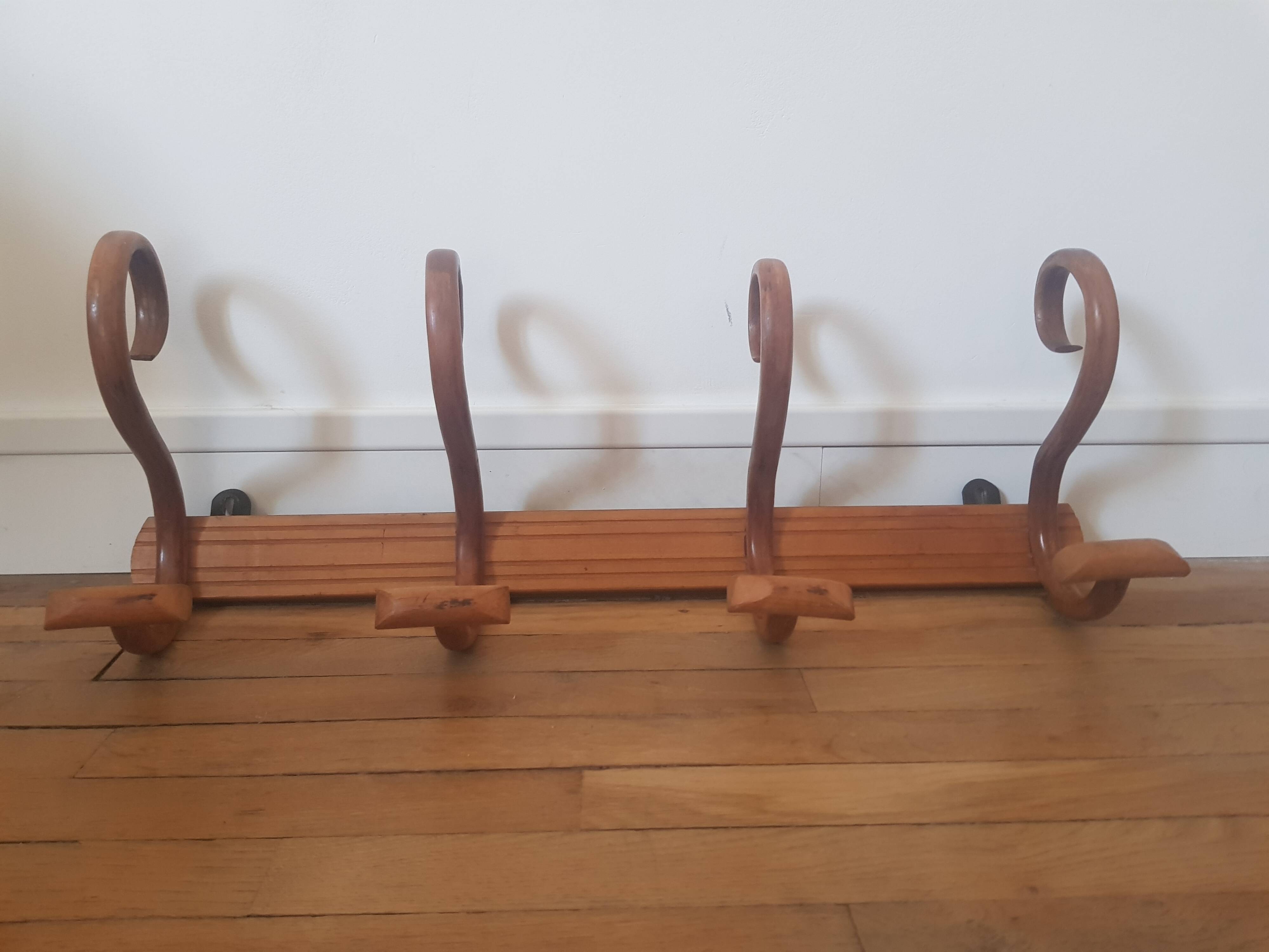 Wooden wall coat rack