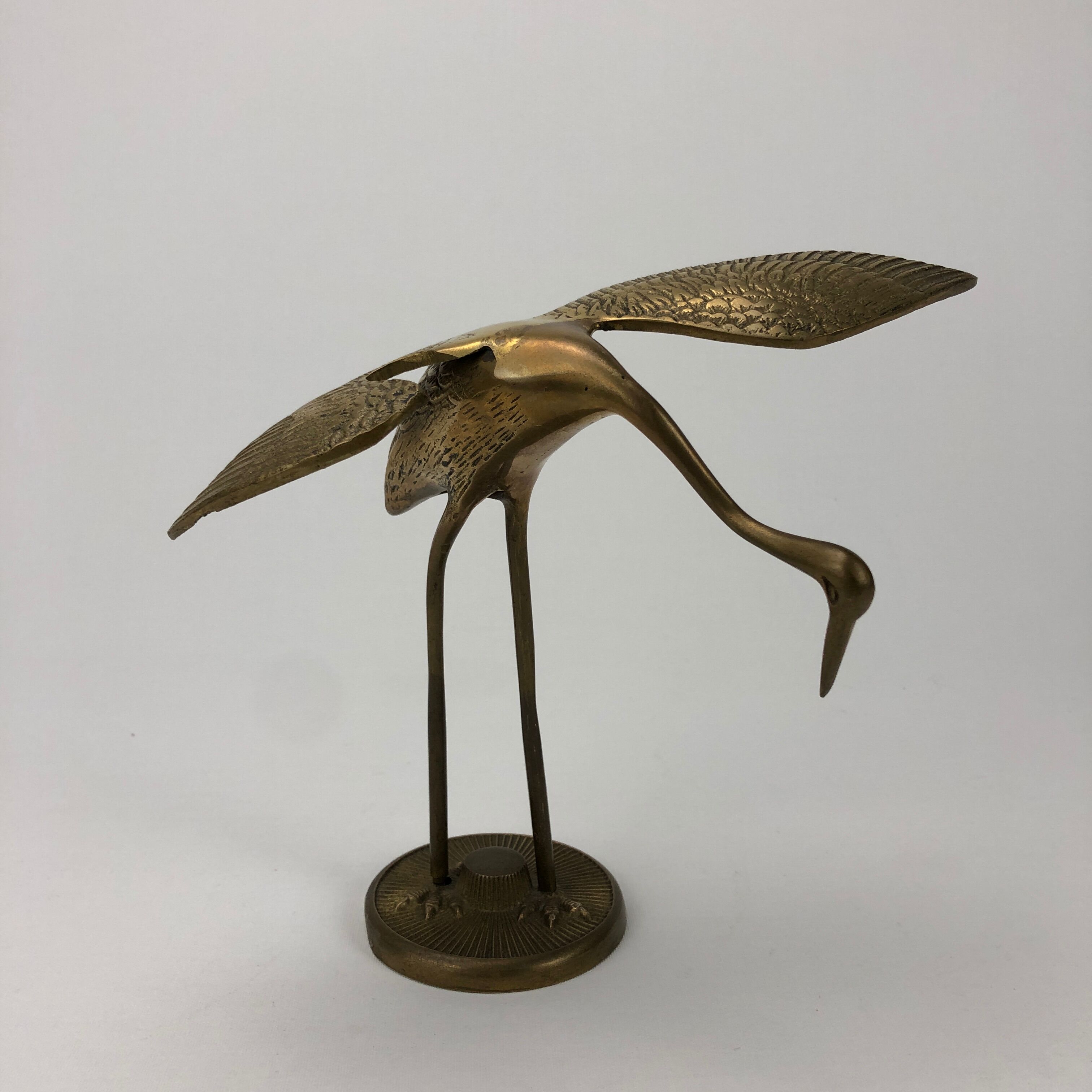 Brass heron couple