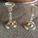 Pair of gold metal candle holders