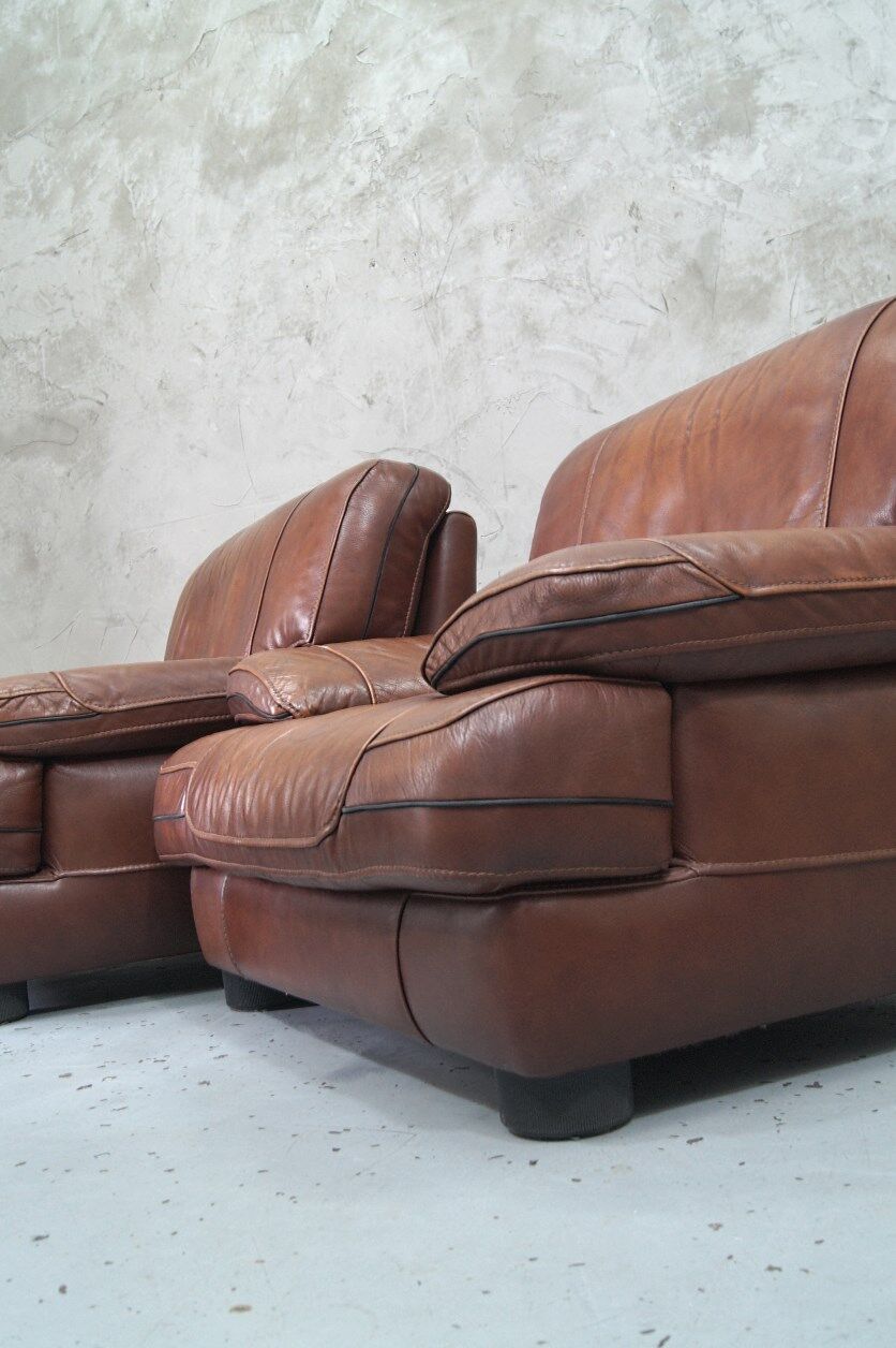 A pair of vintage Italian leather Lounge Chairs, 1970s
