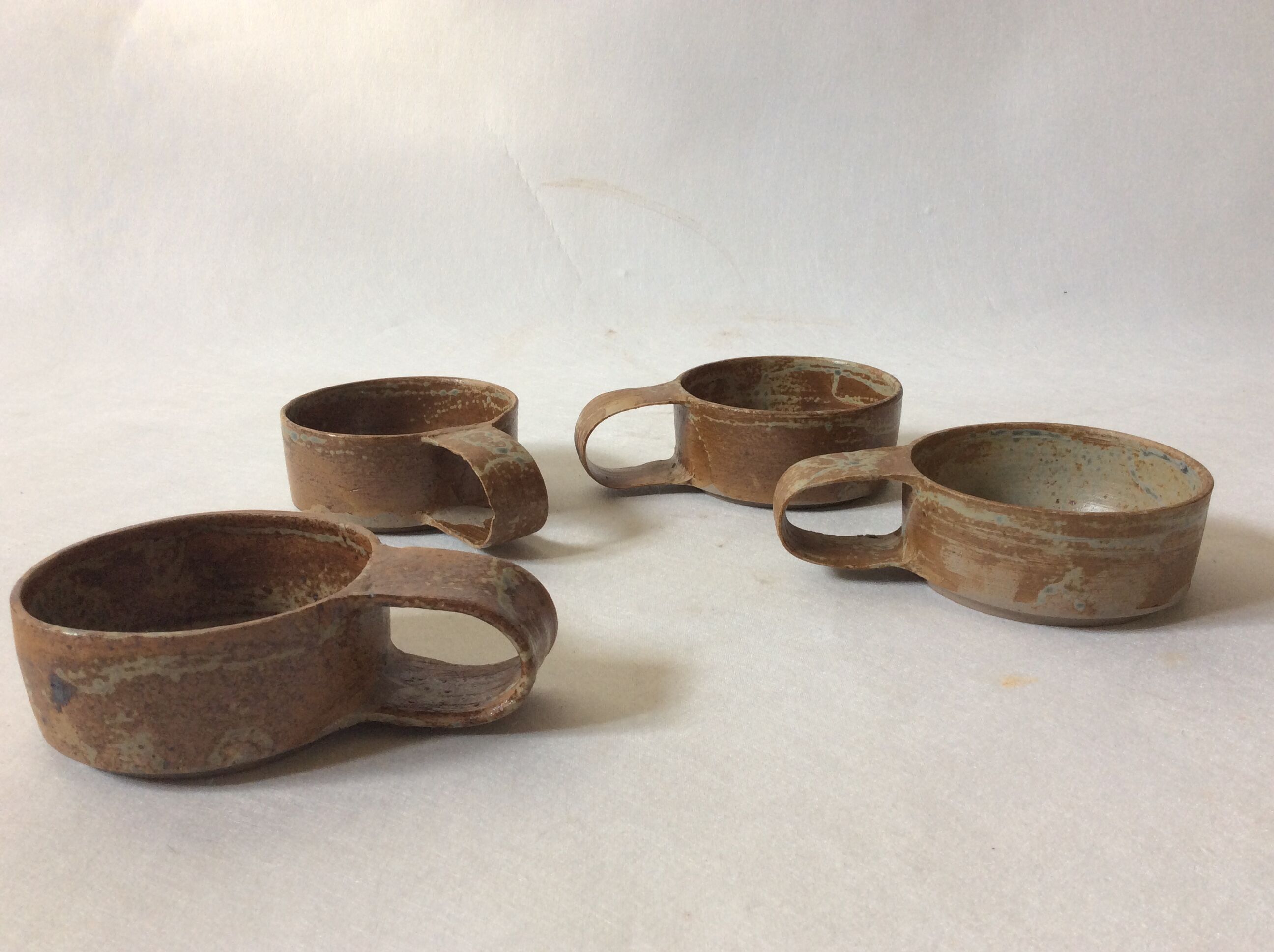 Raw sandstone cups