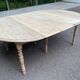 Renovated Louis Philippe round extendable dining table with flaps and 3 extensions.