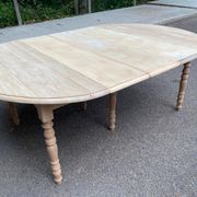 Renovated Louis Philippe round extendable dining table with flaps and 3 extensions.