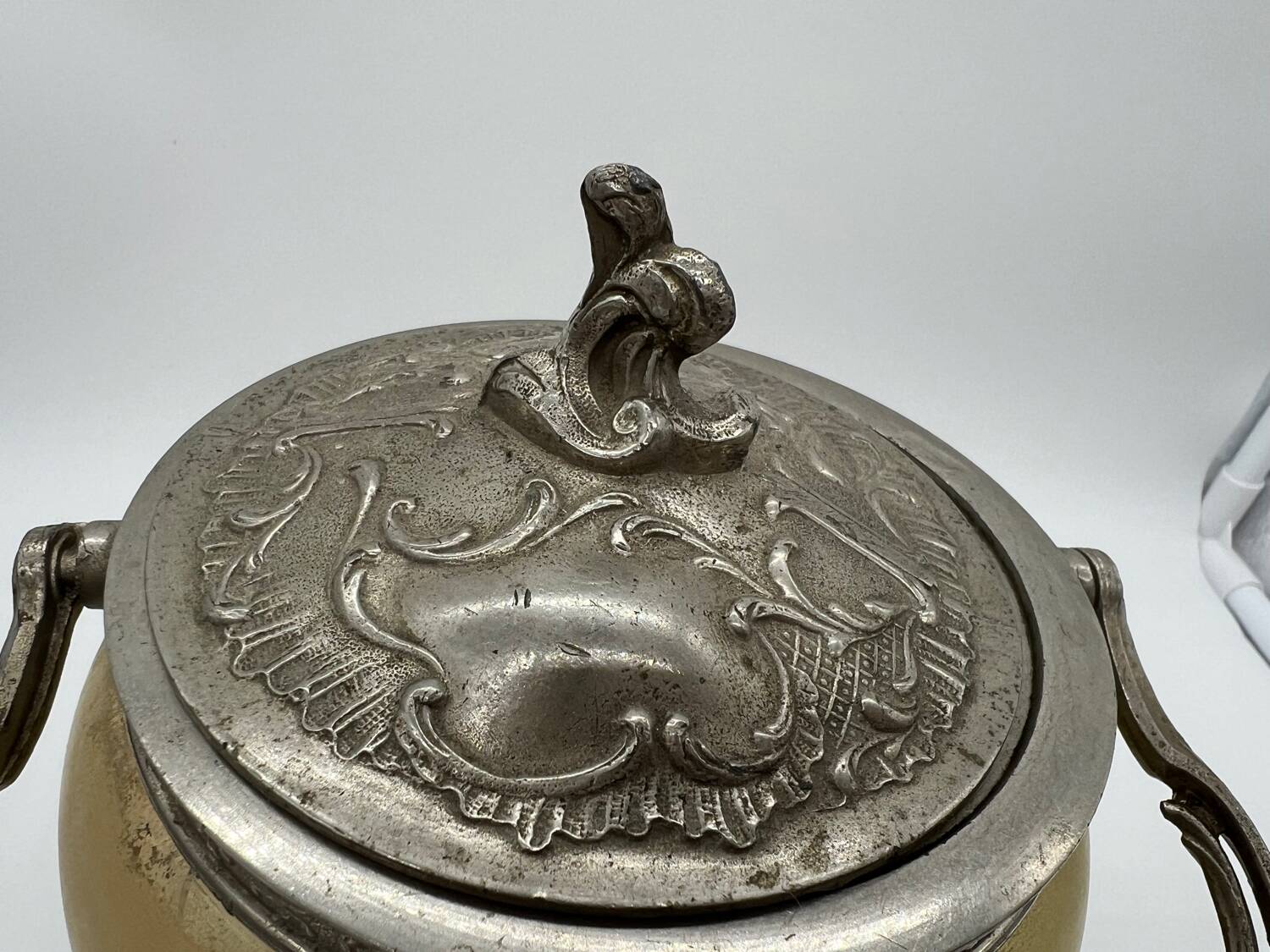 Old enameled glass cookie jar with mill decor