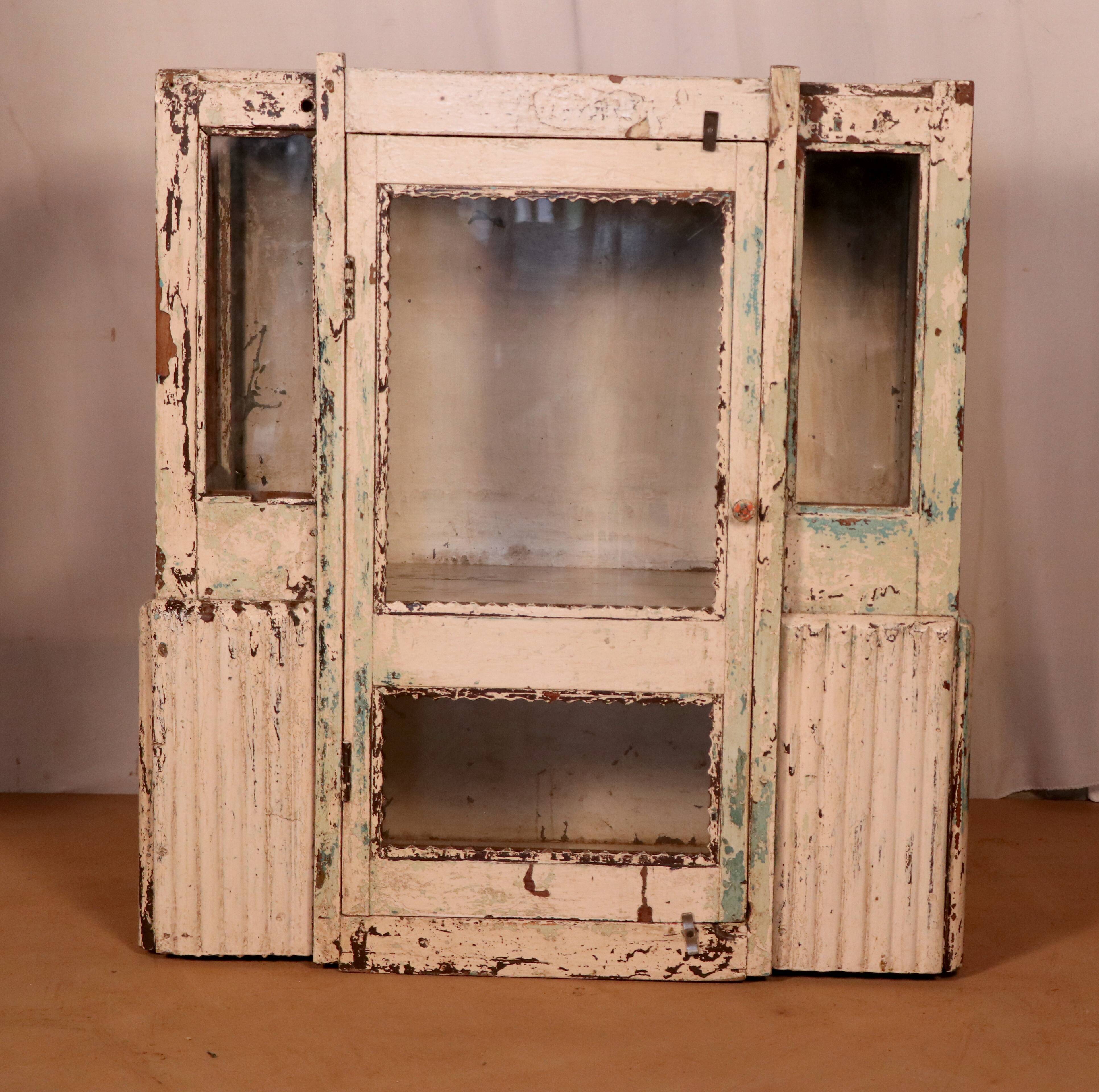 Former art deco cabinet in original burmese teak ecru patina