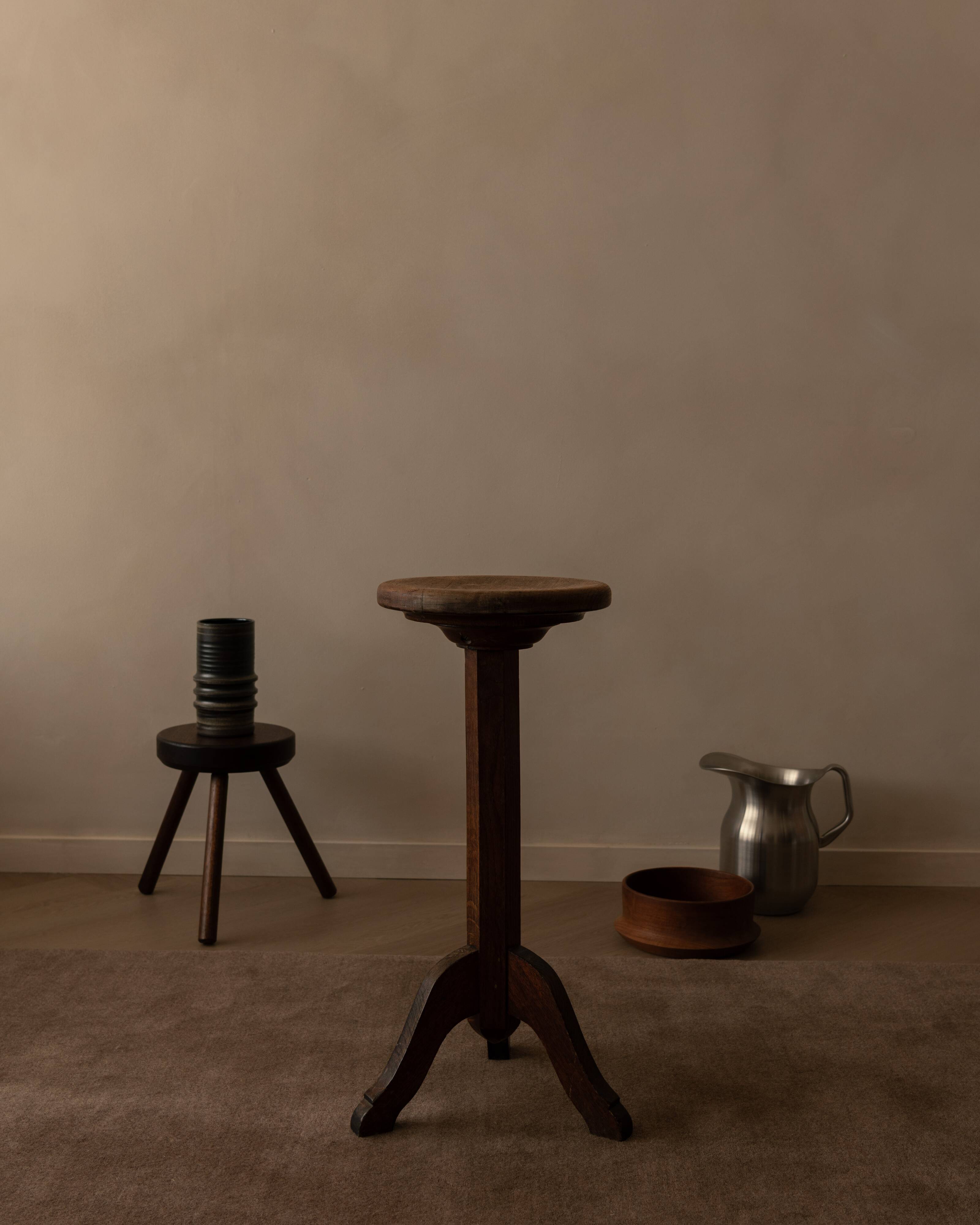 Vintage wooden pedestal plant stand