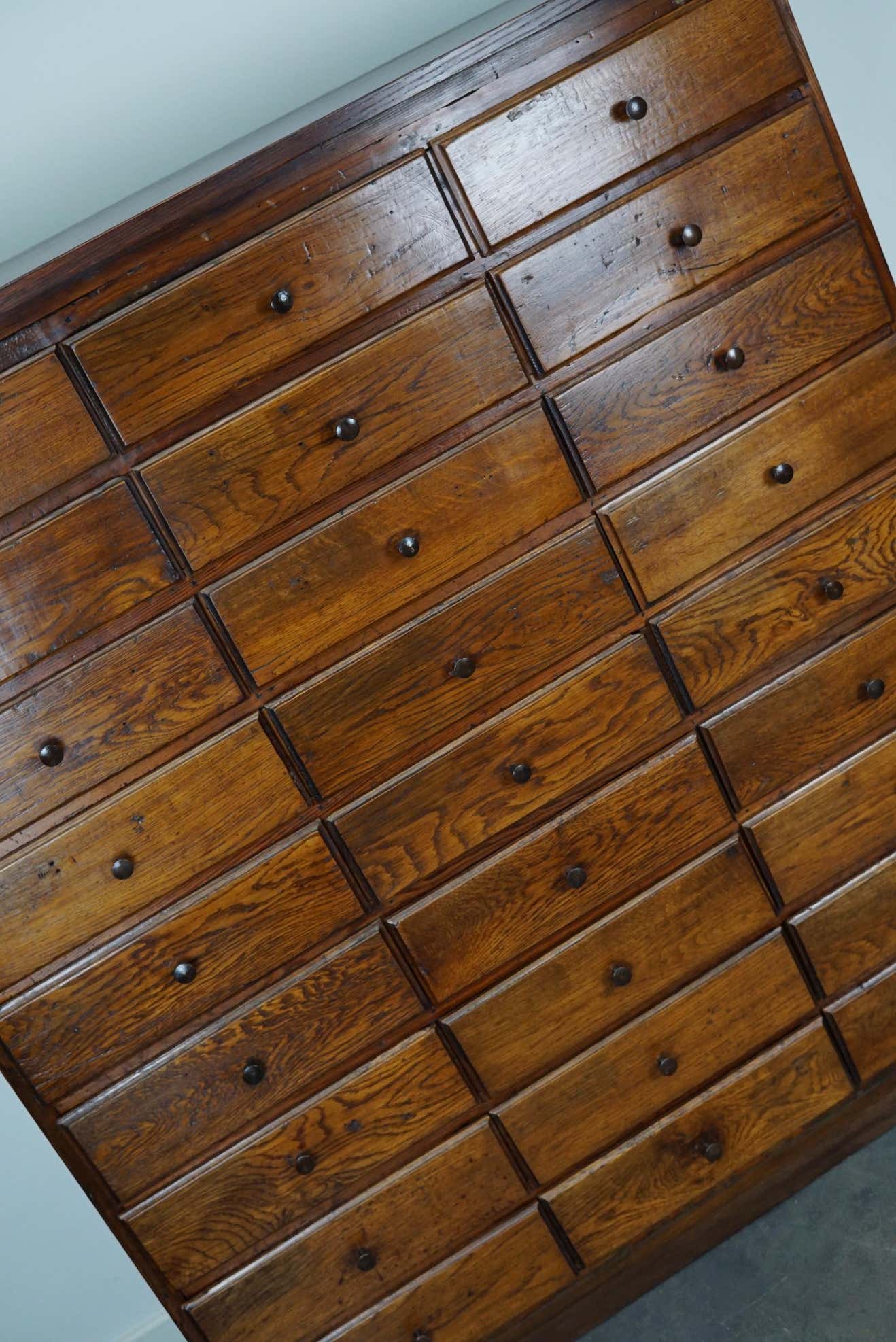 Antique apothecary furniture in oak France early twentieth century