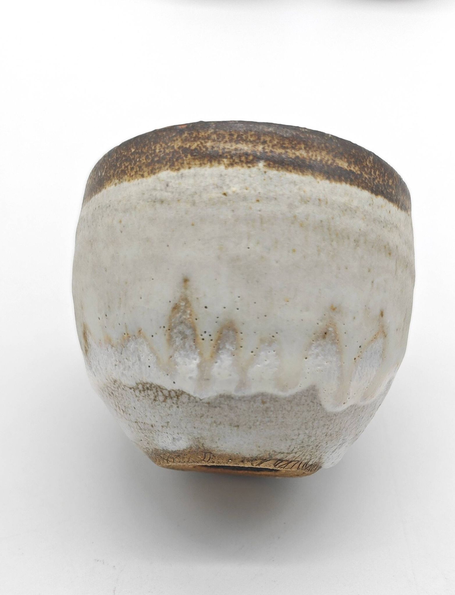 Trilogy of cups or Japanese-style goblets by the Danish ceramist Gutte Eriksen using RAKU technique.
