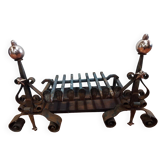 Pair of wrought iron and copper andirons with grille