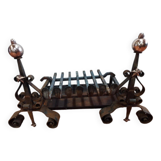 Pair of wrought iron and copper andirons with grille