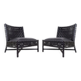 Pair of black woven leather lounge chairs