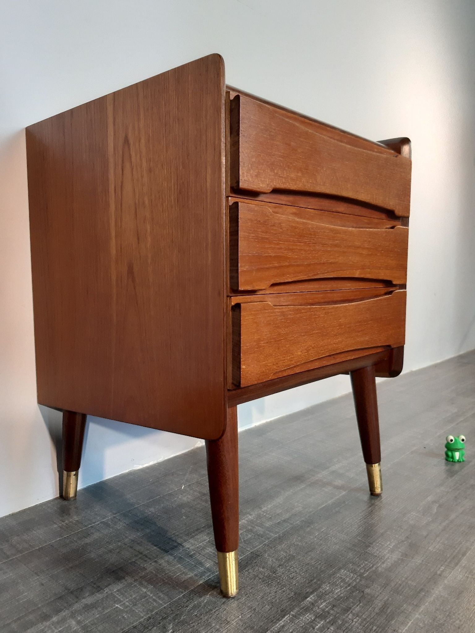 Norwegian bedside table with 3 drawers, teak and brass clogs
