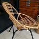 Old vintage metal foot rattan chair