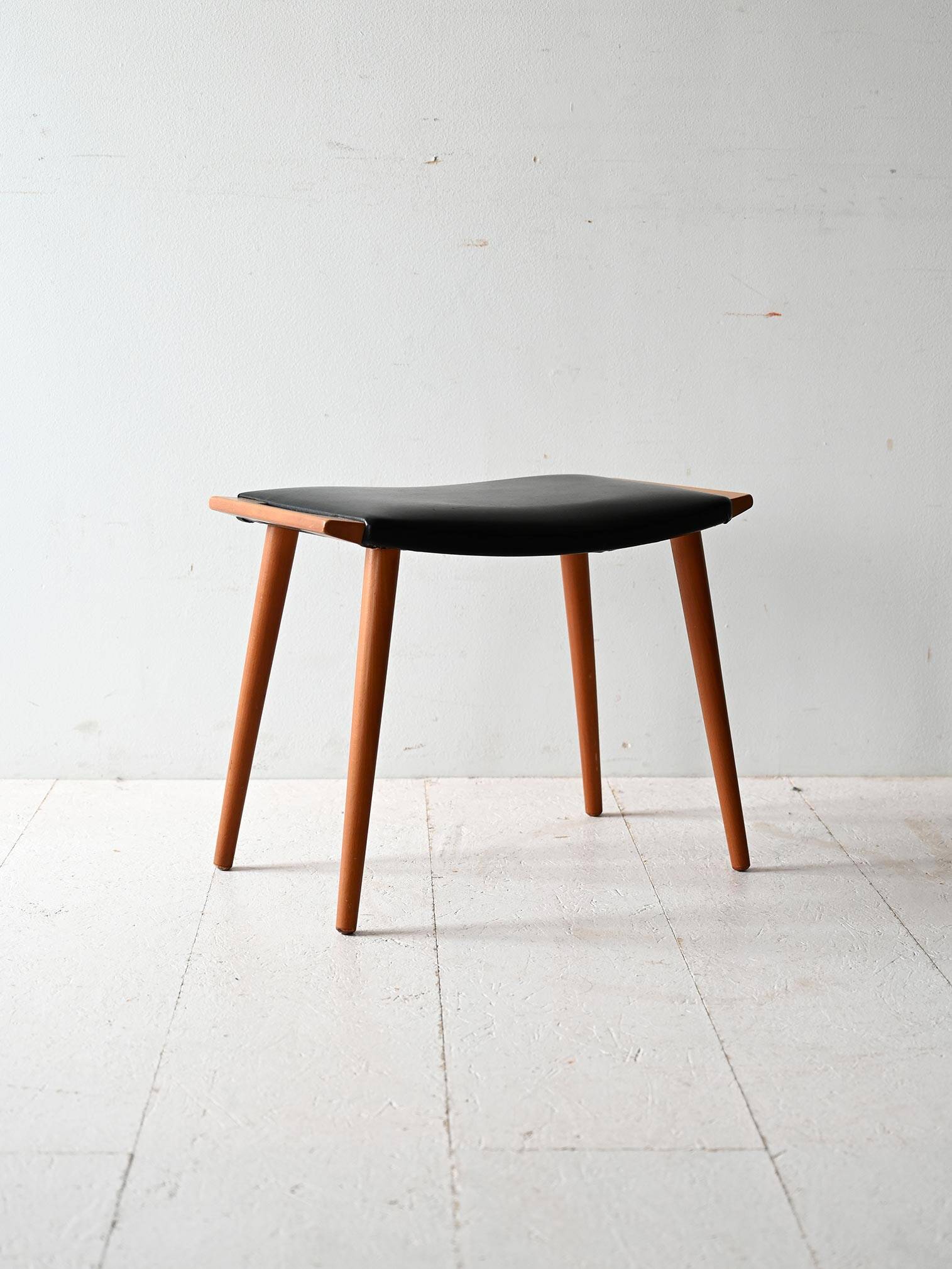 Vintage stool in wood and leather