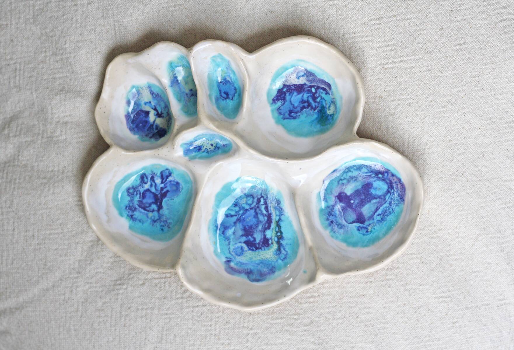 white handmade large ceramic bowl as a jewelry holder or for tapas