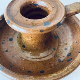 Signed sandstone candle holder