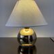 Lampe vintage boule en metal doré années 70