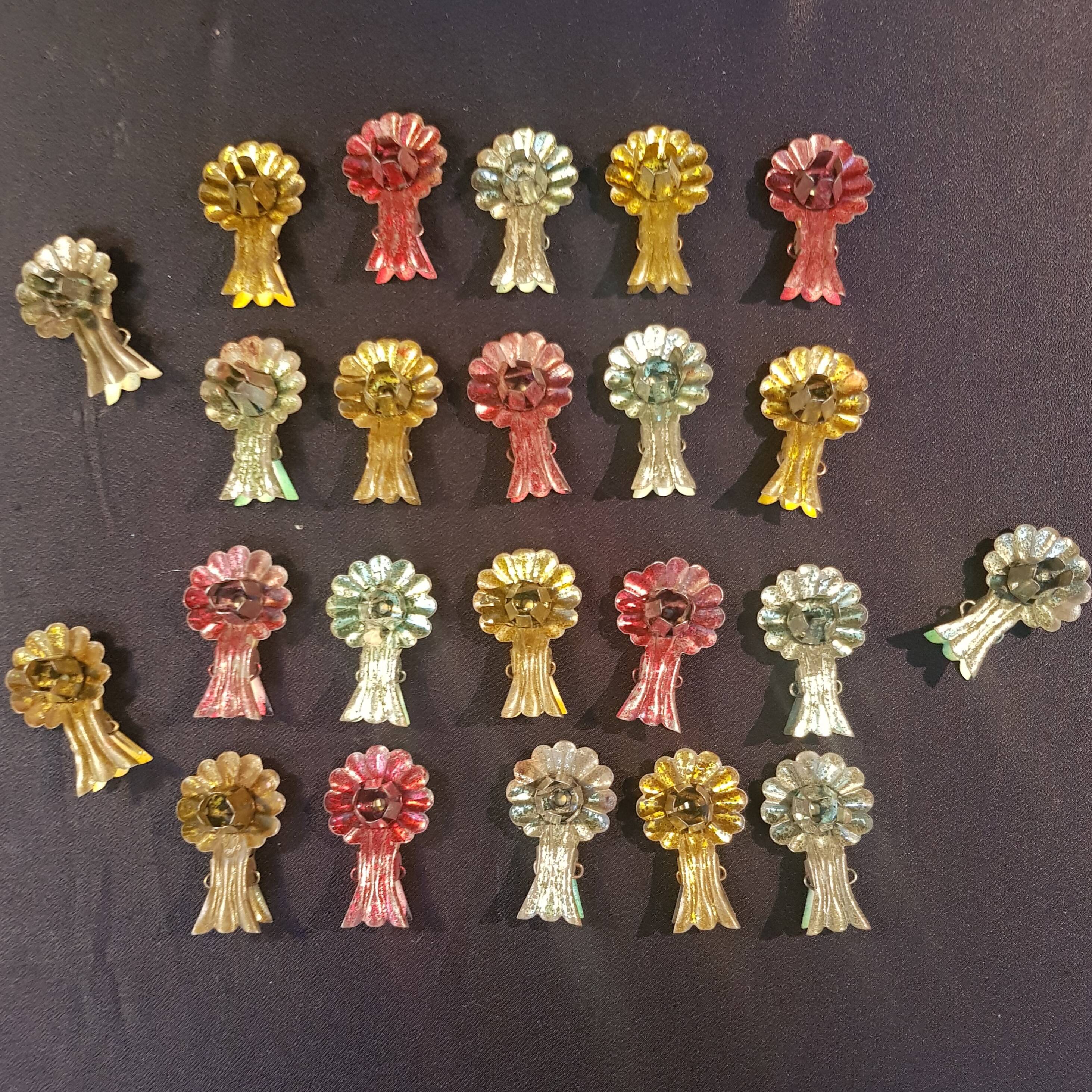 Set of 23 candle tongs