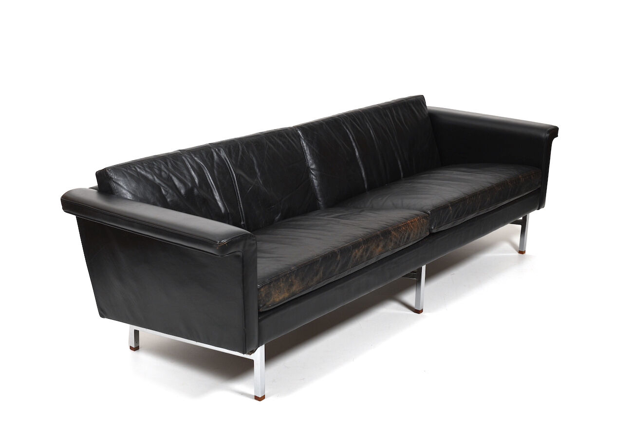 Danish leather sofa with chrome legs and teak ends