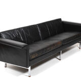 Danish leather sofa with chrome legs and teak ends