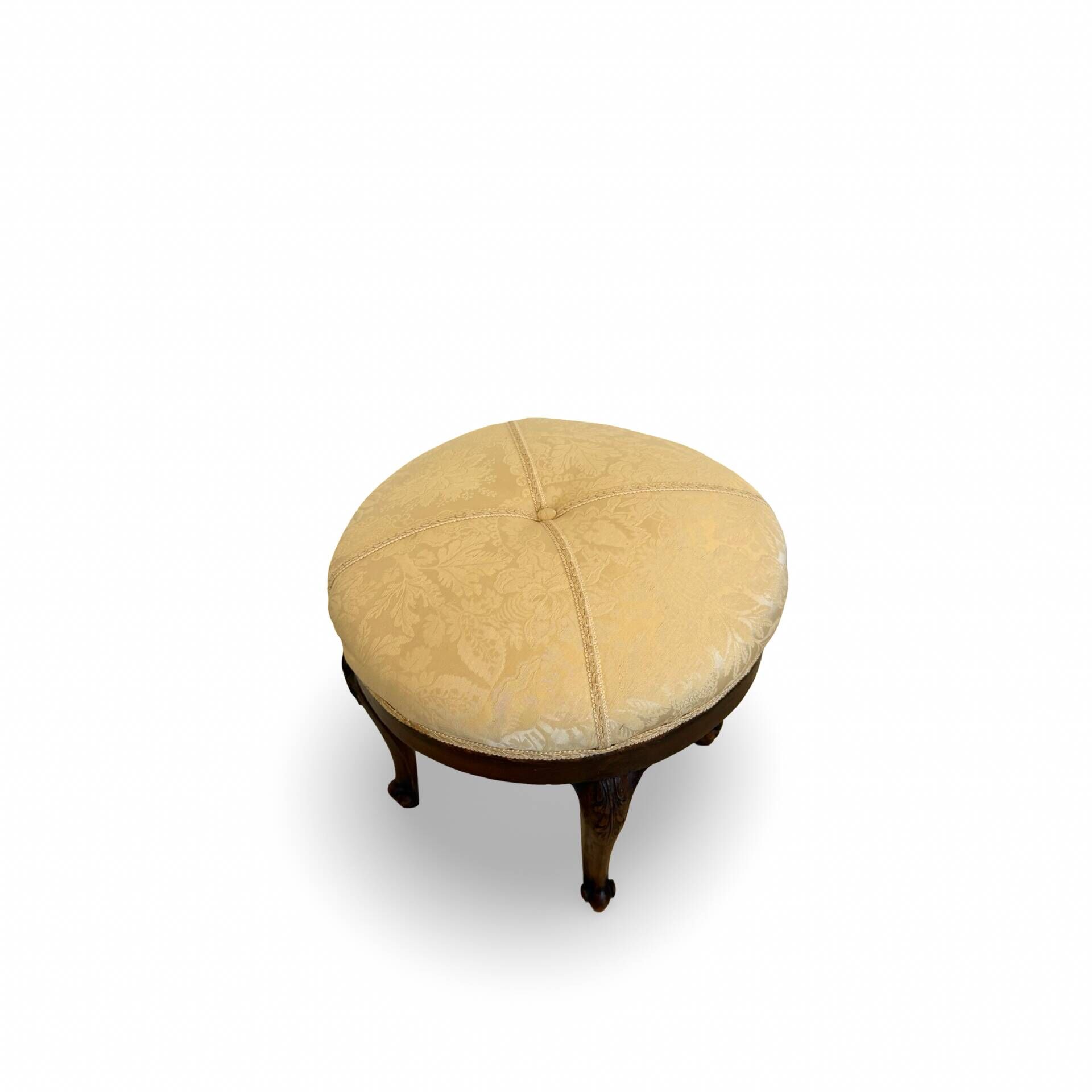 An antique Italian bar chair and a matching tufted vanity stool.