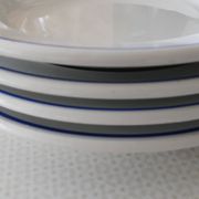 3 Pillivuyt white porcelain dinner plates with blue edging.