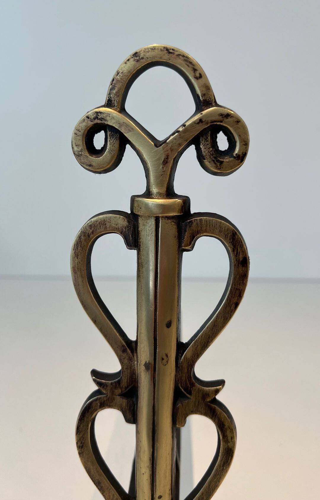 Pair of Brass and Wrought Iron Chenets with Triple Volute and Mount Torch Holders