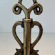Pair of Brass and Wrought Iron Chenets with Triple Volute and Mount Torch Holders