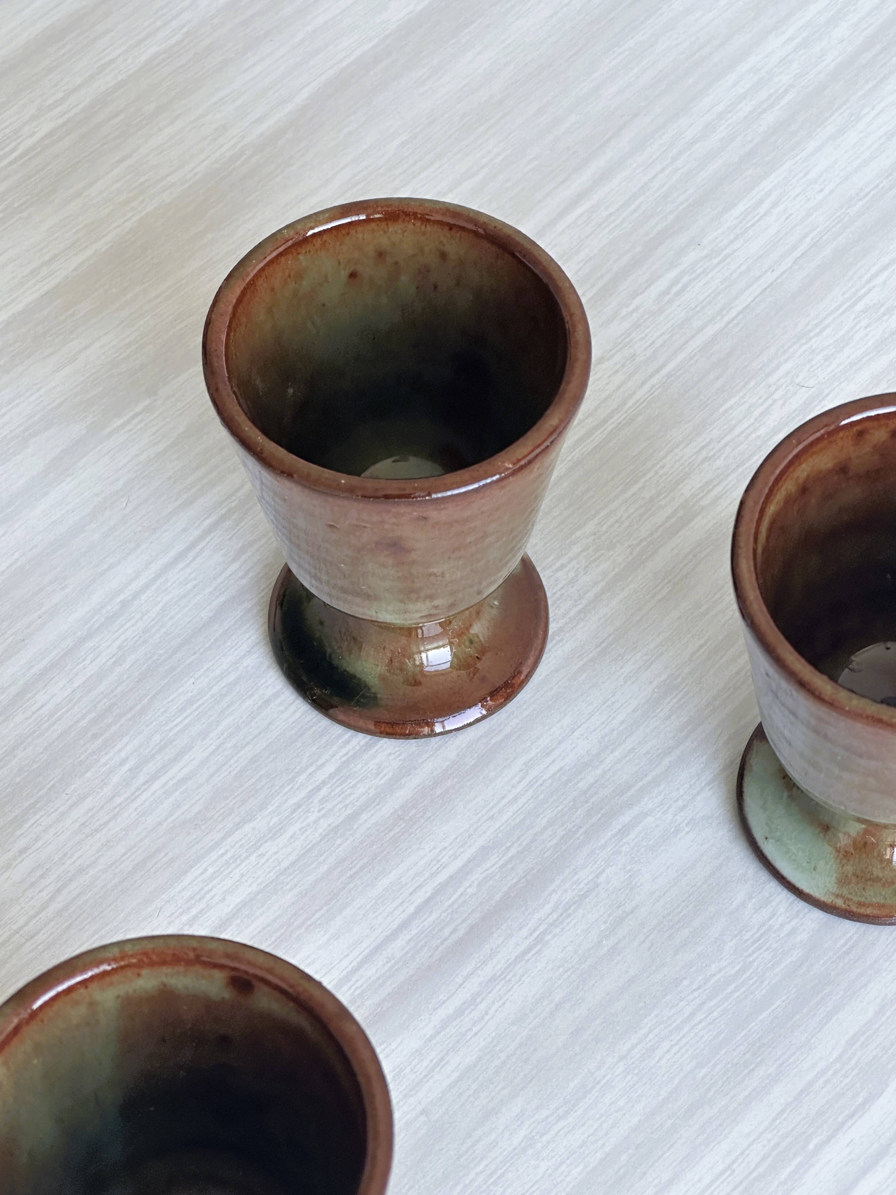 Set of 3 small enamelled ceramic mugs