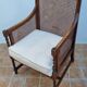 Vintage armchair in turned wood and caning, upholstered seat, 1940s.