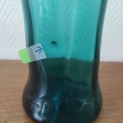Blown glass vase with a flared neck and wavy rim.